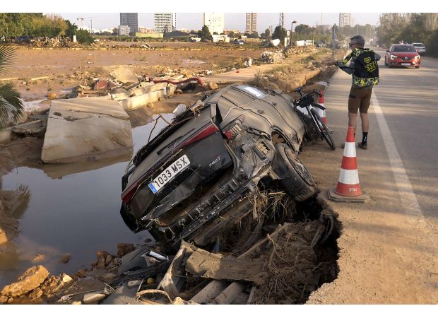 Mother and infant tragically swept away by floodwaters in Spain.