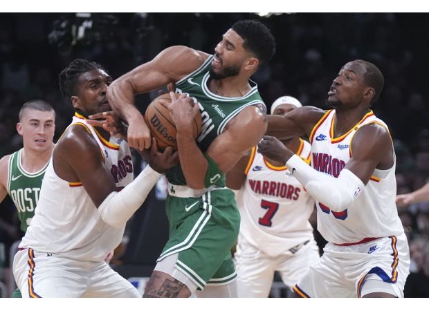 Defense leads Warriors to victory over Celtics in hostile territory.