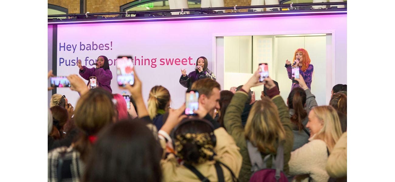 Popular 00s band surprises commuters with train station performance.