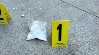Drugs were tossed from building during Melbourne raid