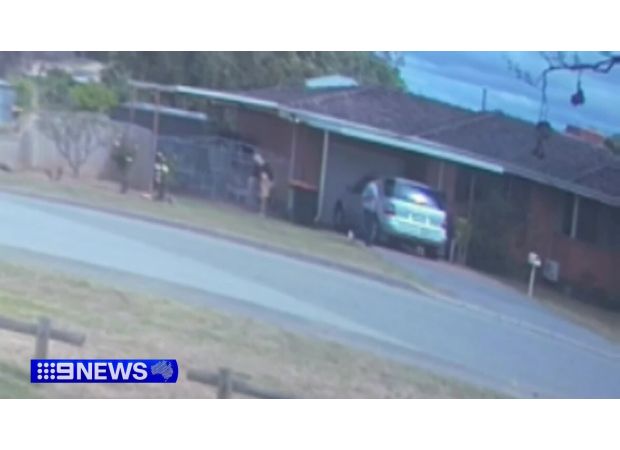 Elderly man forcefully removed from vehicle while wife looked on in fear.