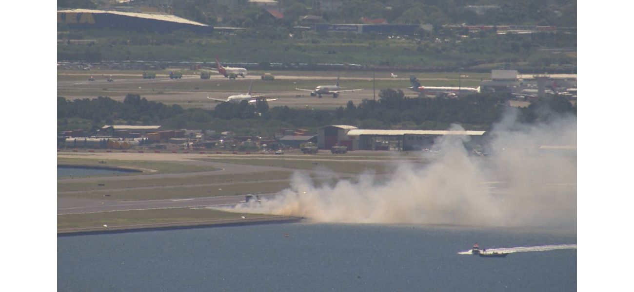 Qantas flight safely lands after causing grassfire due to 'explosion'.