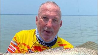 Famous English cricketer Sir Ian Botham saved from dangerous waters with crocodiles after falling.
