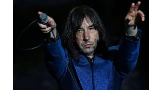 Singer from Primal Scream accuses 80s rock star of trying to advance socially.