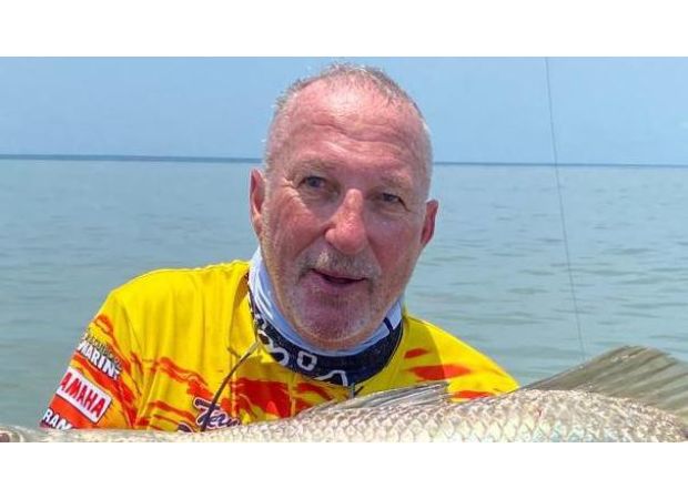 Famous English cricketer Sir Ian Botham saved from dangerous waters with crocodiles after falling.