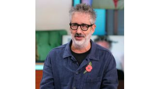Comedian David Baddiel concerned about the potential negative impact of continuing his career on his health.