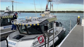 Person rescued after one day overboard from freighter ship