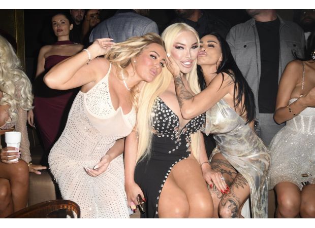 Katie Price kisses Celebrity Big Brother star during night out.