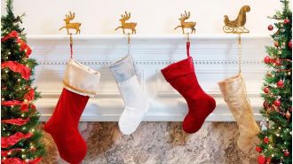 Add some holiday cheer to your fireplace with these decorative stocking hangers.
