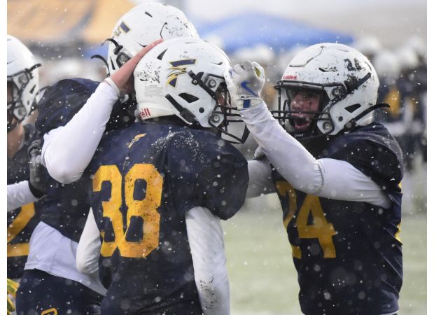 Frederick dominates in snowy 1st-round win.
