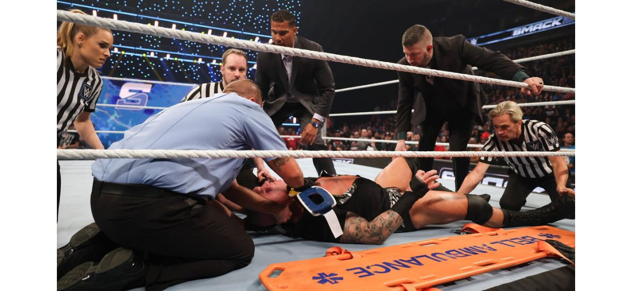 WWE wrestler Randy Orton taken from arena on stretcher after using prohibited move.