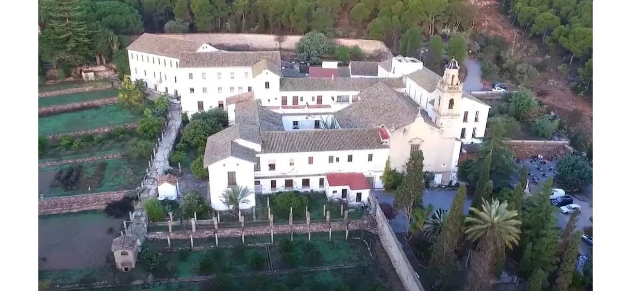 A priest was killed and seven monks were wounded during an assault on a Christian monastery.