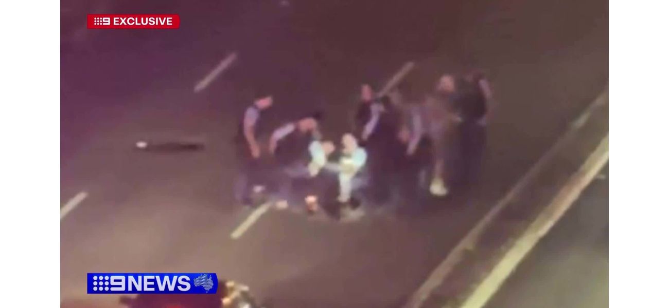 Police use Taser to apprehend man on busy Sydney street.