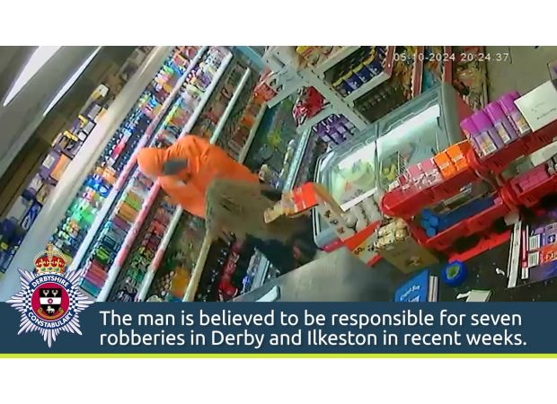 Courageous store owner defends against thief using a mop.