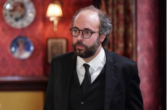 EastEnders actor addresses rumors of leaving soap, expressing concern over outcome.