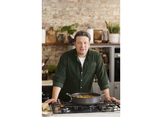 Celebrity chef Jamie Oliver removes children's book following backlash from Indigenous Australians.