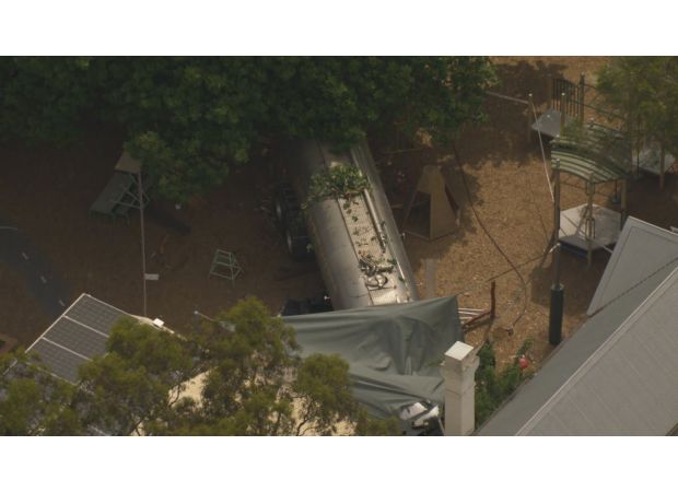 Fatal truck crash at Victorian kindergarten leaves one adult dead and a child wounded.