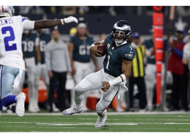 Eagles dominate Cowboys 34-6 with 4 TDs from Hurts, despite Prescott's absence.