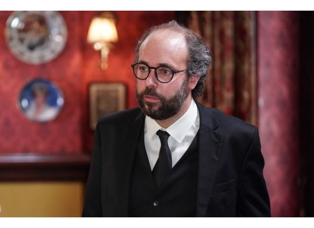 EastEnders actor addresses rumors of leaving soap, expressing concern over outcome.