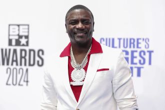 Akon stands by his sexual lyrics and has no intention of changing them, defending his 00s hits.