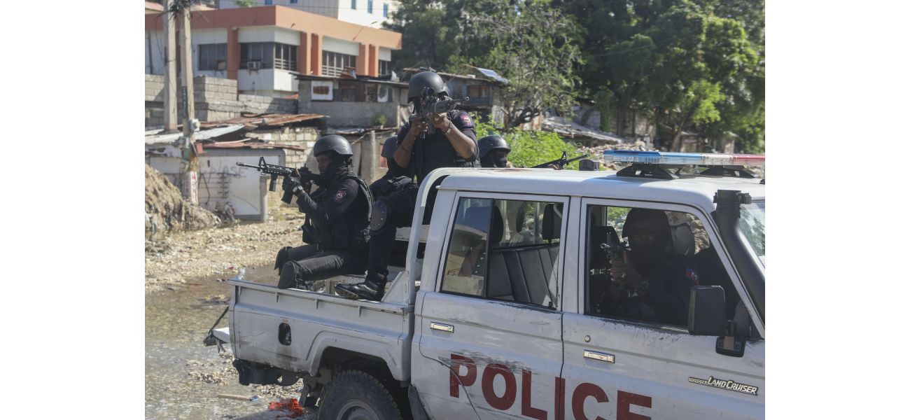 Haiti's main airport closed due to gunfire on plane.