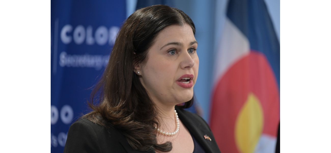 Denver district attorney looking into secretary of state's office for possible security breach of voter system passwords.