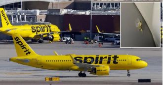 Flight forced to land after gunshots wound crew member causing emergency landing.