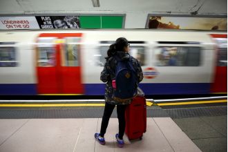 Two London subway lines shut down due to signal malfunction and debris on rails.