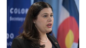 Denver district attorney looking into secretary of state's office for possible security breach of voter system passwords.