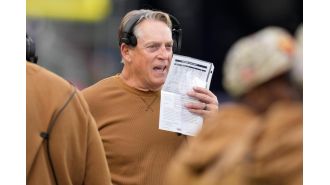 Jack Del Rio's departure from Wisconsin's team following his arrest for operating a vehicle while under the influence.