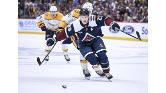 Girard's OT goal secures Avalanche's victory against Predators.