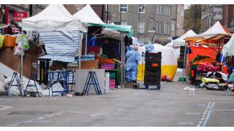 A man in his 60s accused of killing someone with a knife at a London market.