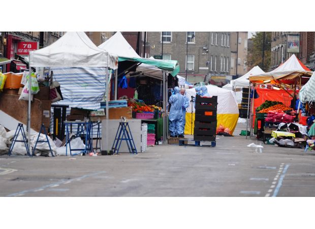 A man in his 60s accused of killing someone with a knife at a London market.