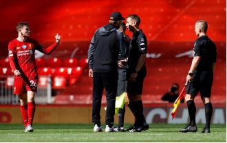 Andy Robertson angrily confronts David Coote in leaked video, questioning his purpose.
