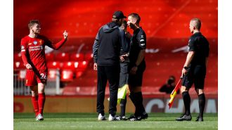 Andy Robertson angrily confronts David Coote in leaked video, questioning his purpose.