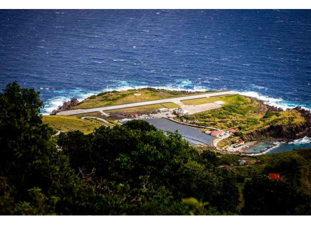Tiniest airport has runway too short for planes, requires waiver for landing.