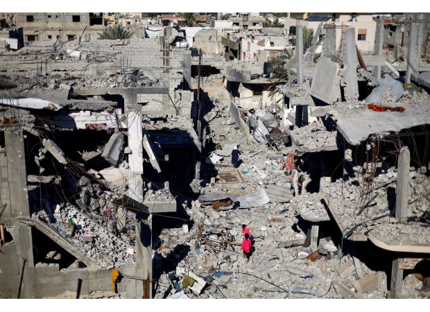 Despite the bombings in her father's neighborhood, the speaker's father refuses to evacuate.