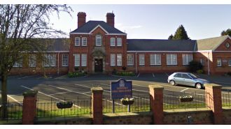 A 12-year-old girl was taken into custody for allegedly using scissors to harm a school employee.