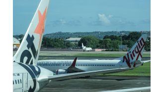 Volcanic eruption in Indonesia causes flight cancellations in Bali due to ash clouds.