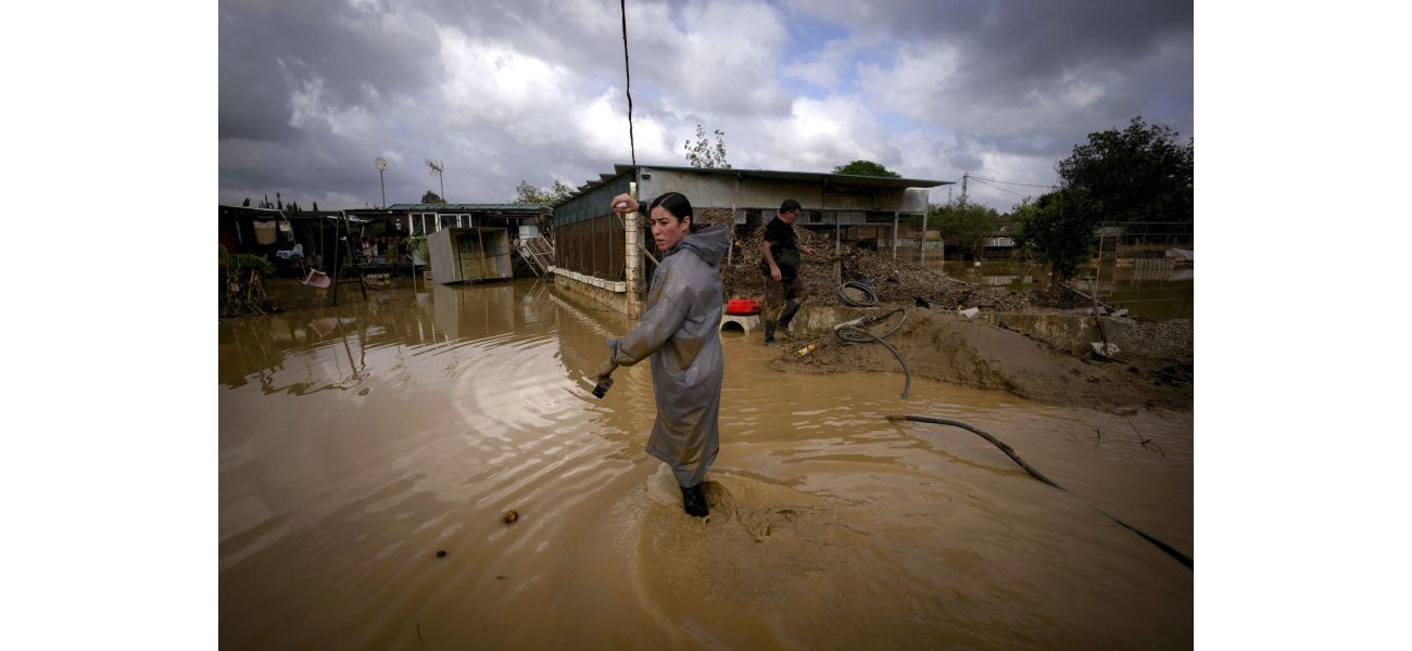 Thousands forced to leave popular vacation spot in Spain due to concerns of potential severe flooding.