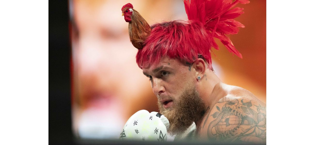 Jake Paul sports a unique hairstyle resembling a rooster as he prepares for his highly anticipated fight against Mike Tyson.