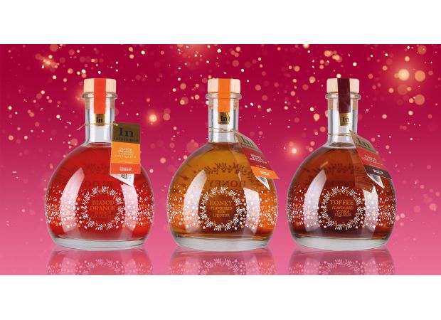 Add some shimmer to your holiday drinks with Aldi's Shimmer Globe Liqueurs.
