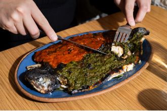 Discover the recipe for Pescado a la Talla, a popular dish served in red and green sauces.