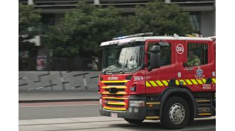 Firefighters are unable to access their stations due to a 3G shutdown, causing them to resort to jumping over fences.