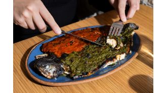 Discover the recipe for Pescado a la Talla, a popular dish served in red and green sauces.