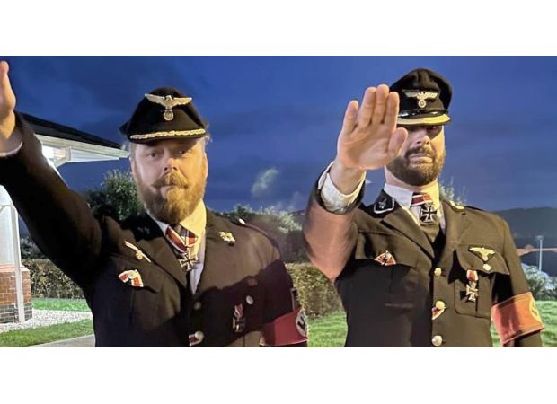 Pictures of British soldiers wearing Nazi costumes at a party were exposed to the public.