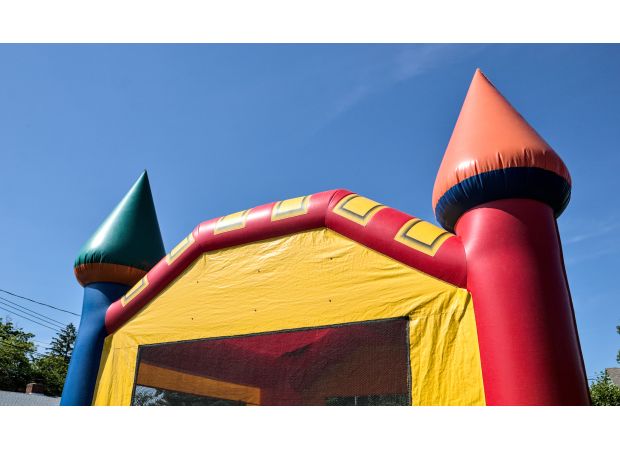 A bouncy castle at Melbourne school event was not properly secured.