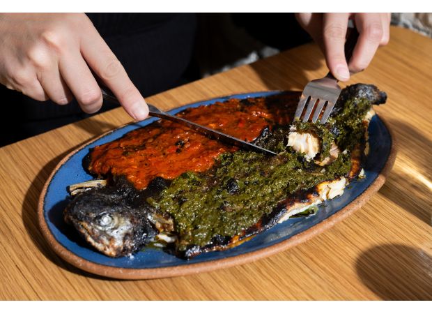 Discover the recipe for Pescado a la Talla, a popular dish served in red and green sauces.