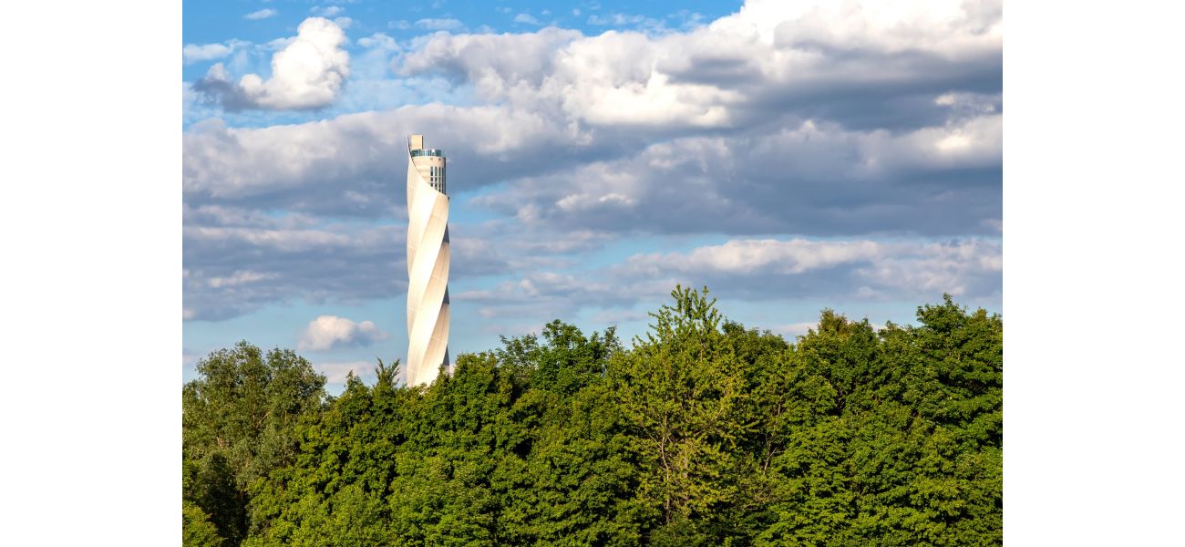 Curiosity surrounds the construction of a 807ft tall building in the heart of a forest.