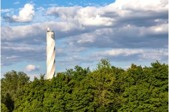 Curiosity surrounds the construction of a 807ft tall building in the heart of a forest.